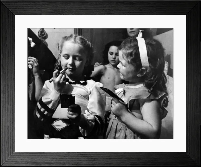 Framed Print : Two young performers seen here making themselves up before the performance of the Easter Framed Print : Two young performers seen here making themselves up before the performance of the Easter