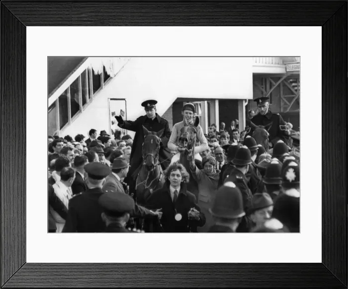 Framed Print : The winner! Twenty-year-old Brian Fletcher rides Red Alligator through the crowds in Framed Print : The winner! Twenty-year-old Brian Fletcher rides Red Alligator through the crowds in