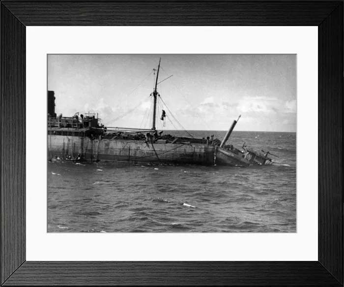 Framed Print : World War II: Shipping. A torpedo from a U-boat had cut the ship practically in two Framed Print : World War II: Shipping. A torpedo from a U-boat had cut the ship practically in two