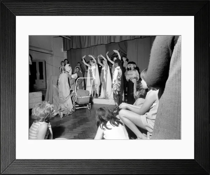 Framed Print : A Hippie street singer, and Mary pushing a pram, were part of a school Framed Print : A Hippie street singer, and Mary pushing a pram, were part of a school
