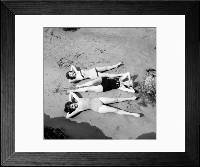 Framed Print : Beach pattern for three, sunning on the golden Sands at Fistral Beach, Newquay Framed Print : Beach pattern for three, sunning on the golden Sands at Fistral Beach, Newquay