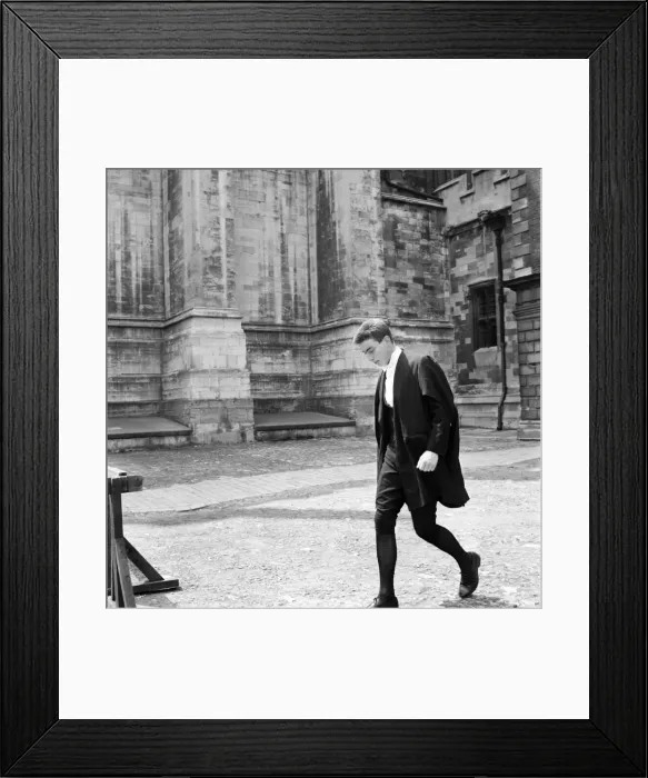 Framed Print : Eton Celebrations. The Etonian hurrying across the Cloisters at Eton College this weekend