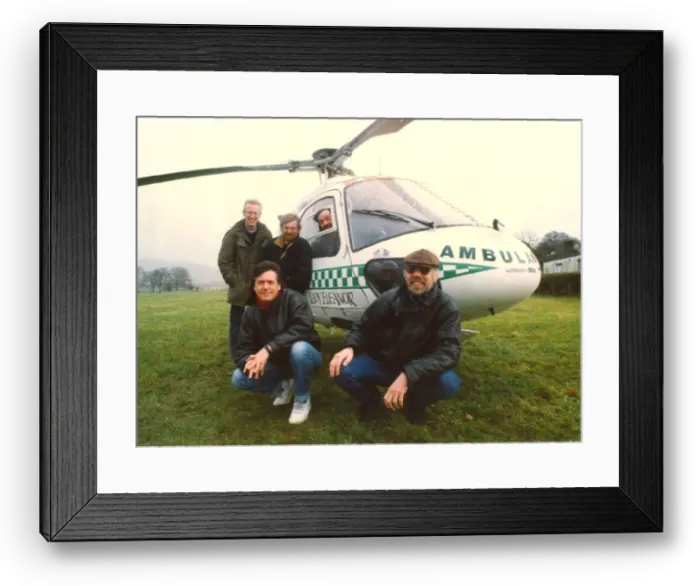 Framed Print : Lindisfarne pictured with the Lady Eleanor air ambulance helicopter Framed Print : Lindisfarne pictured with the Lady Eleanor air ambulance helicopter
