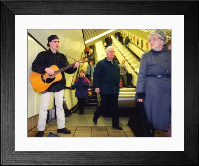 Framed Print : A busker in the Monument Metro Station in Newcastle Framed Print : A busker in the Monument Metro Station in Newcastle