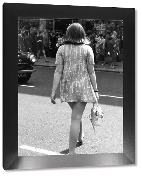 A young wearing a mini-mini dress in height of the swinging sixties