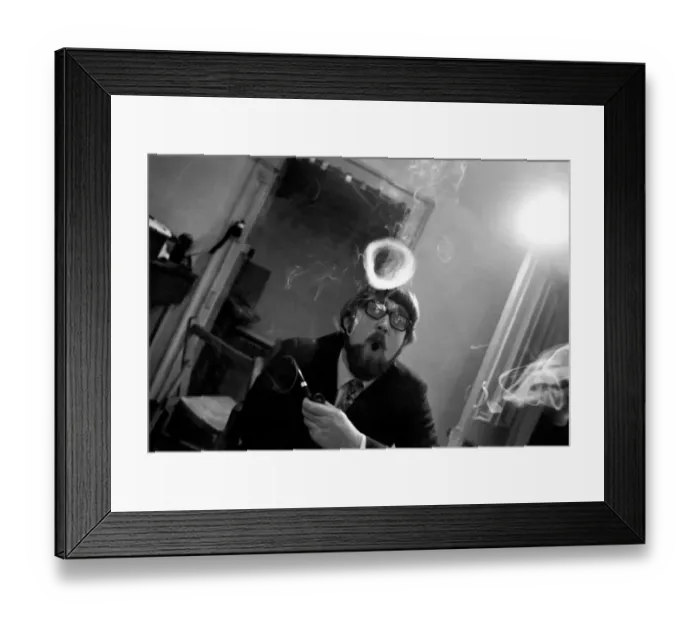 Framed Print : A man smoking a cigarette blowing smoke rings. November 1969 Z12004-005 Framed Print : A man smoking a cigarette blowing smoke rings. November 1969 Z12004-005
