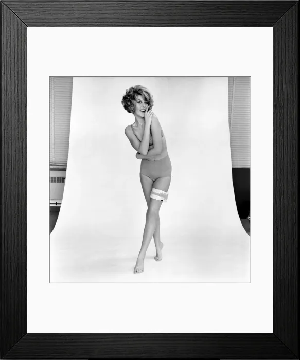 Framed Print : Dynathigh Electonic leg Exerciser on model girl Delia Freeman in the Daily Mirror Studio