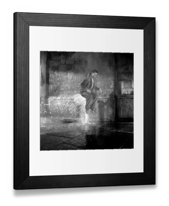 Framed Print : George Cole famous comedy film star was blown up through a manhole will a water jet seven Framed Print : George Cole famous comedy film star was blown up through a manhole will a water jet seven