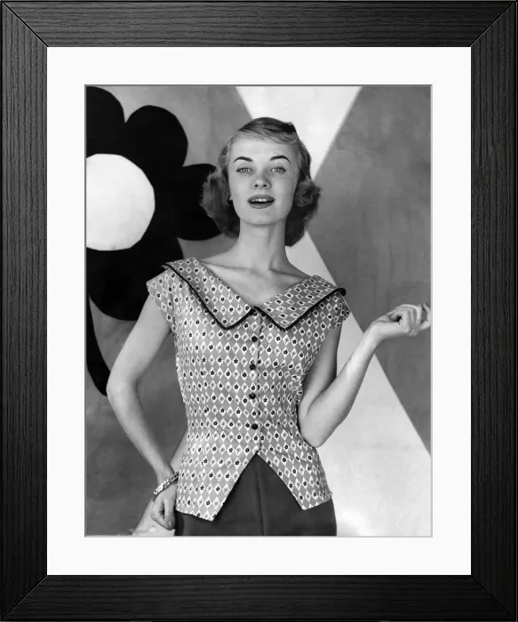 Framed Print : Woman poses wearing sleveless patterned blouse with large collar. July 1955 P012657 Framed Print : Woman poses wearing sleveless patterned blouse with large collar. July 1955 P012657