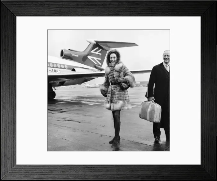 Framed Print : Film Actor David Niven, and his wife Hjordis arrived in London from Geneva today