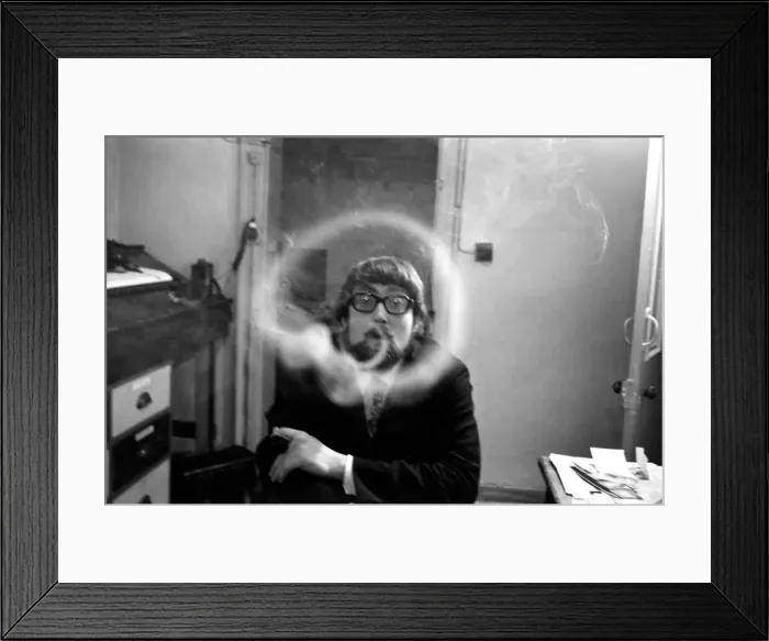Framed Print : A man smoking a cigarette blowing smoke rings. November 1969 Z12004 Framed Print : A man smoking a cigarette blowing smoke rings. November 1969 Z12004