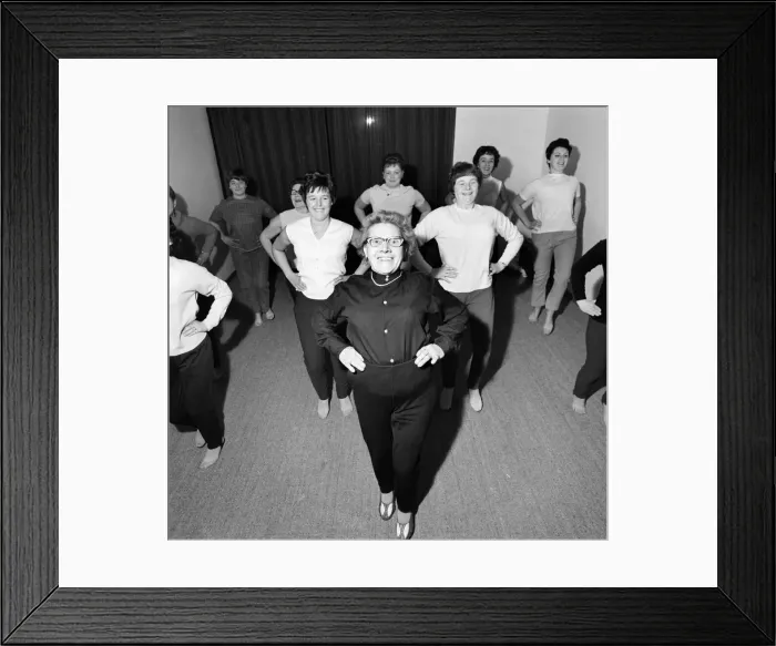 Framed Print : 77-year-old Mrs Alice Baker taking her keep Fit