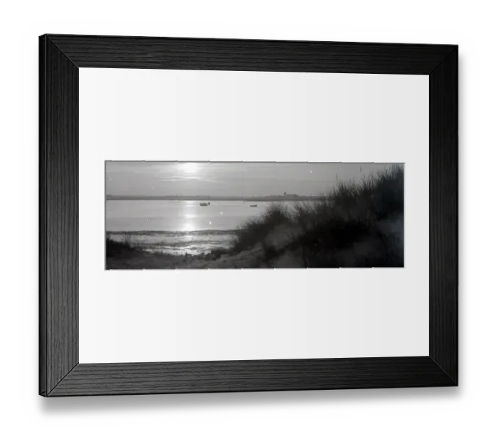 Framed Print : View of the sunset over the water at Christchurch Head in Dorset Framed Print : View of the sunset over the water at Christchurch Head in Dorset