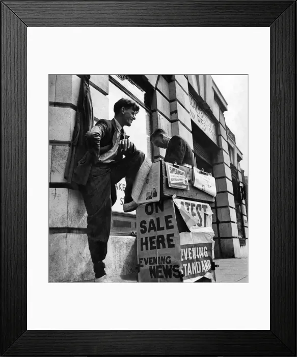 Framed Print : Newspaper seller on a London street. Circa 1950 P009218
