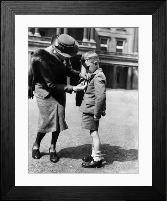 Framed Print : The King presented Posthumous Medals and Awards at the Investiture at Buckingham Place