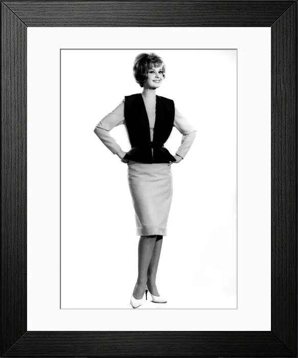 Framed Print : Model Dawn Chapman wearing waistcoat with pencil skirt, standing with hands on hips Framed Print : Model Dawn Chapman wearing waistcoat with pencil skirt, standing with hands on hips