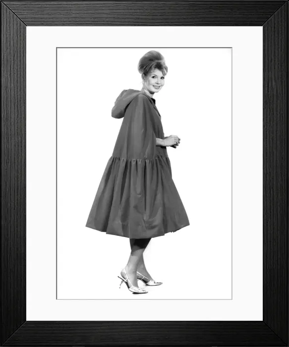 Framed Print : Model Liz Duke wearing a coat with hood. December 1962 P008880 Framed Print : Model Liz Duke wearing a coat with hood. December 1962 P008880
