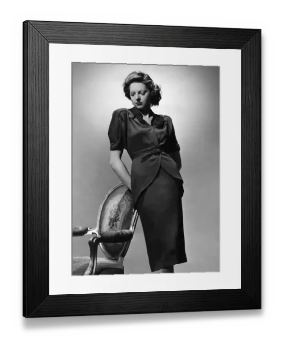 Framed Print : Fashion 1940 s: New style jacket dipping at back, sequin design on shoulders Framed Print : Fashion 1940 s: New style jacket dipping at back, sequin design on shoulders
