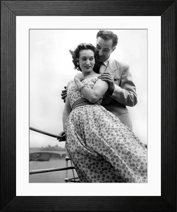 Framed Print : Man and woman together on a boat. May 1956 P009027 Framed Print : Man and woman together on a boat. May 1956 P009027