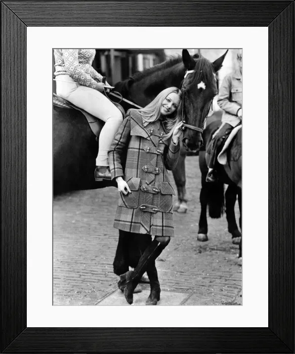 Framed Print : Far Left: A winner for winter weather, a coat with deep shoulder cape