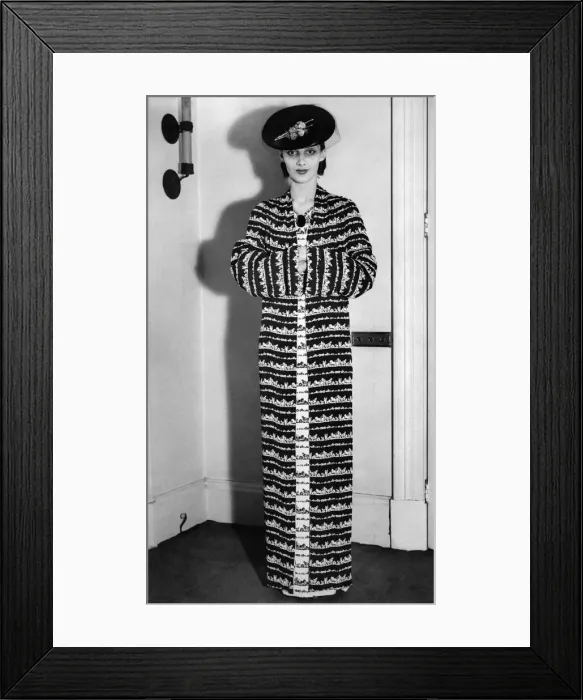Framed Print : Mandarin costume of white crepe de chine chiped navy. Navy hat in fine straw Framed Print : Mandarin costume of white crepe de chine chiped navy. Navy hat in fine straw