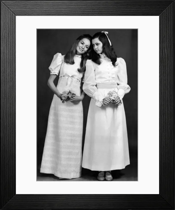 Framed Print : Demure in white. At left, white broderie anglaise trimmed with yellow ribbons by Framed Print : Demure in white. At left, white broderie anglaise trimmed with yellow ribbons by