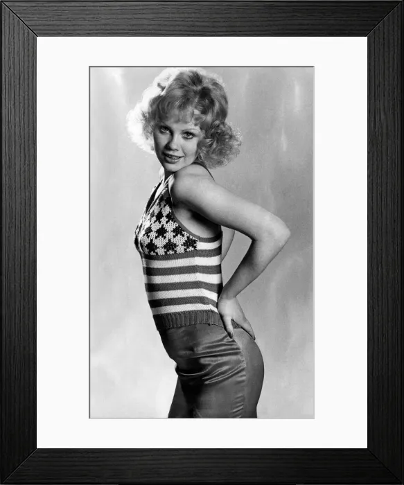 Framed Print : Peek-a-boo sweater with a provocative look has subtly bared shoulders, by Beckol