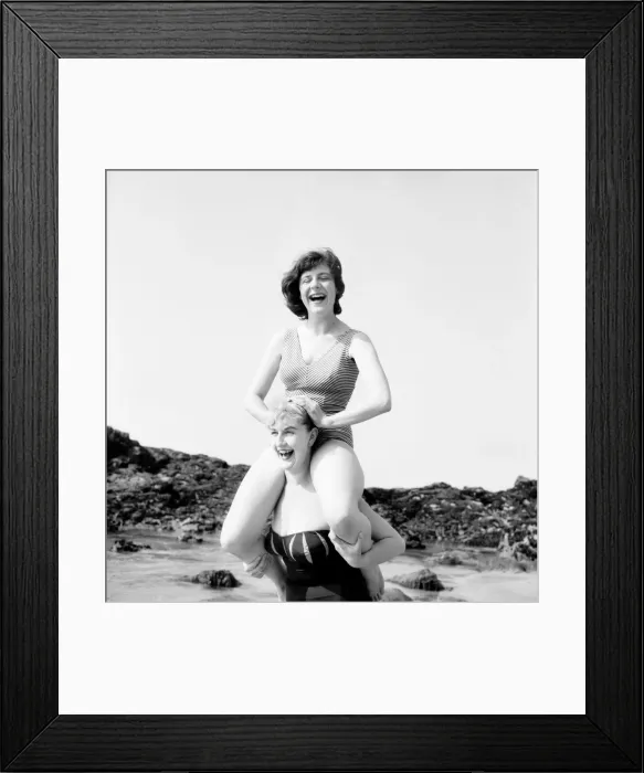 Framed Print : Shelagh Dawson waded into the sea carrying Wendy Shaw. June 1960 M4364-002