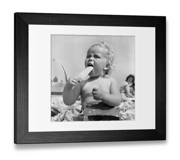 Framed Print : Baby and Lolly. Derorah Ann Clowes 13 months from Stoke on treat enjoys herself in
