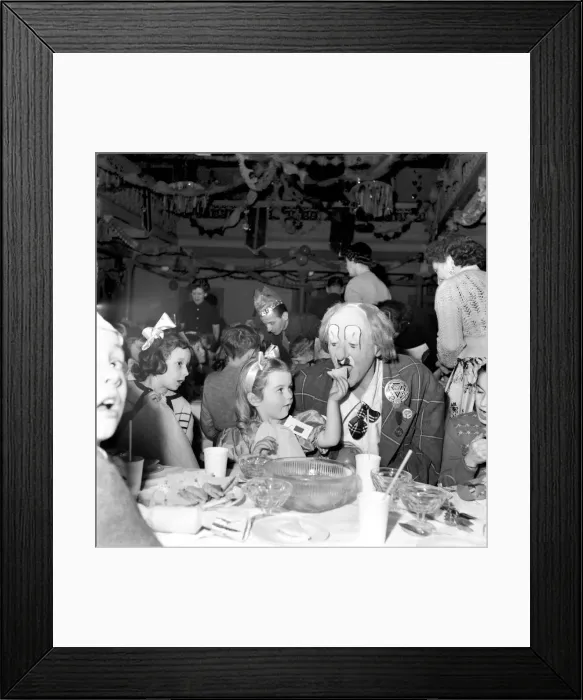 Framed Print : A clown at a childrens party. December 1953 D7572 Framed Print : A clown at a childrens party. December 1953 D7572