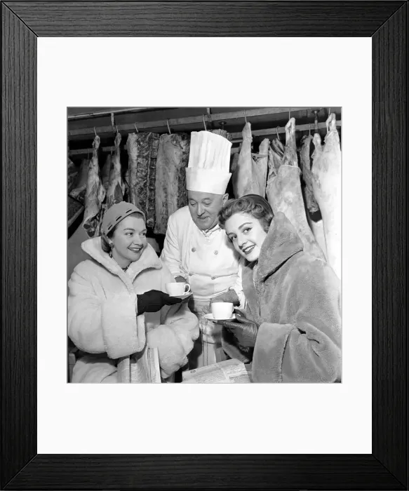 Framed Print : Two models sat in a cold room to test a new fur fabric (see left) at a London Hotel Framed Print : Two models sat in a cold room to test a new fur fabric (see left) at a London Hotel