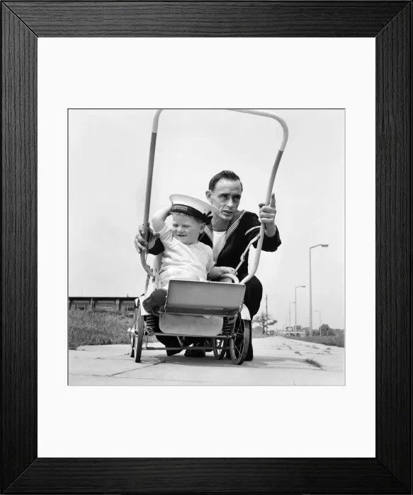 Framed Print : Bank holiday at Tynemouth. Man with child in pram. June 1960 M4320-009 Framed Print : Bank holiday at Tynemouth. Man with child in pram. June 1960 M4320-009