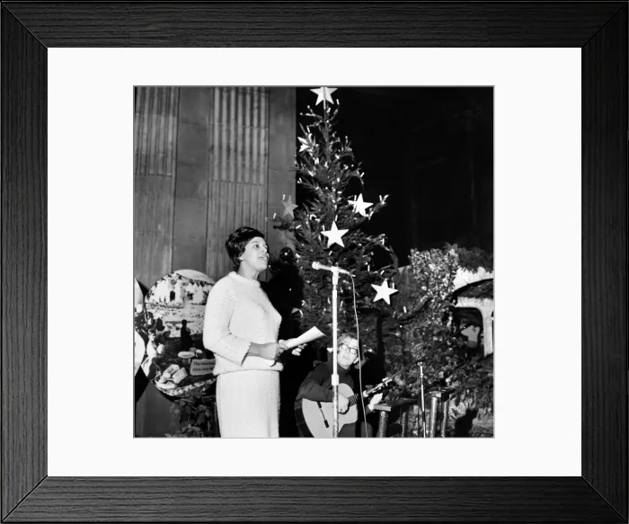 Framed Print : At a lunchtime concert at St. Pauls Cathedral today, West Indian folk singer Nadia Framed Print : At a lunchtime concert at St. Pauls Cathedral today, West Indian folk singer Nadia
