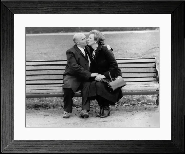 Framed Print : April Fools Day, On a park bench, Mrs Thatcher. hangs on to her handbag Framed Print : April Fools Day, On a park bench, Mrs Thatcher. hangs on to her handbag