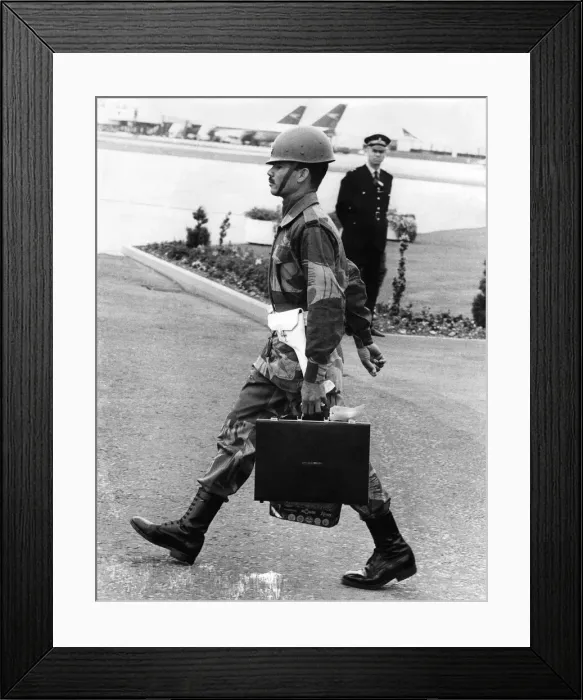 Framed Print : President Ali Bhutto of Pakistan arriving at Heathrow with his own bodyguard for an Framed Print : President Ali Bhutto of Pakistan arriving at Heathrow with his own bodyguard for an
