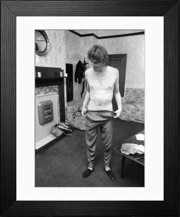 Framed Print : Boomtown Rats'on Tour Bob Geldof changing after show. October 1979 P003855 Framed Print : Boomtown Rats'on Tour Bob Geldof changing after show. October 1979 P003855