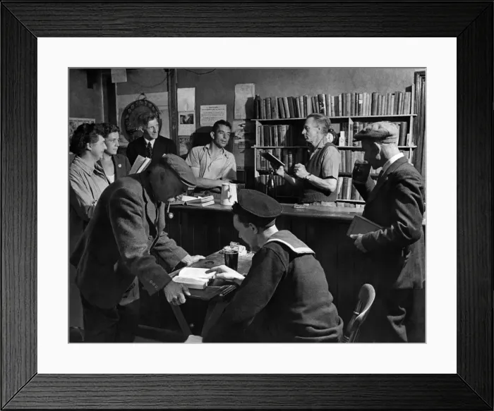 Framed Print : Library in Village pub. You can have a thriller with your pint of beer in the bar of
