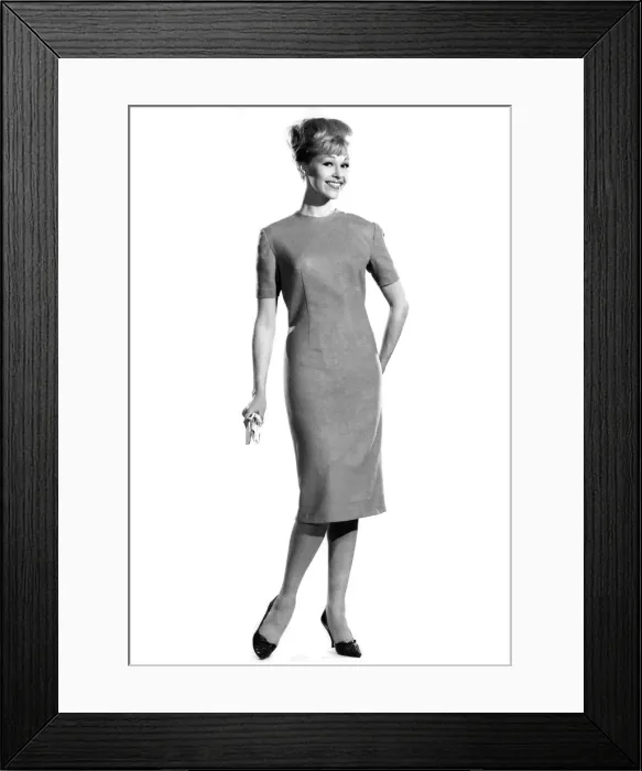 Framed Print : Woman wearing long, straight dress. Reveille Fashions. Jo Wanning. October 1962 P008864 Framed Print : Woman wearing long, straight dress. Reveille Fashions. Jo Wanning. October 1962 P008864
