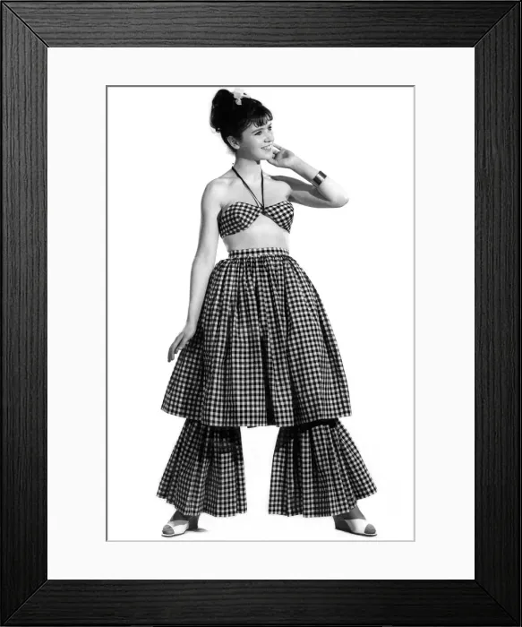 Framed Print : Woman wearing flared, checked dress. Reveille Fashions. Rosemary Bell. April 1962 P008849 Framed Print : Woman wearing flared, checked dress. Reveille Fashions. Rosemary Bell. April 1962 P008849