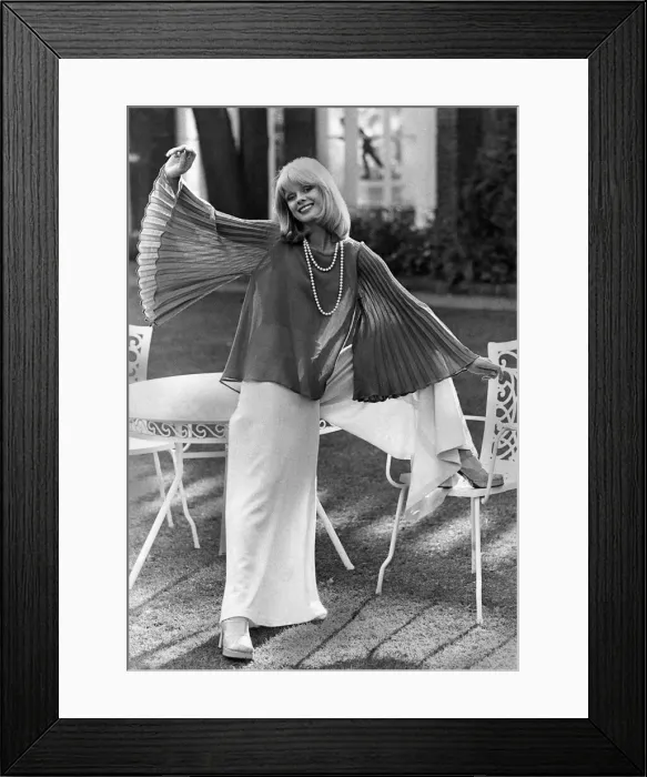Framed Print : Clothing: Fine wool crepe blouse, flaring from rounded neckline, has wide pleated sleeve Framed Print : Clothing: Fine wool crepe blouse, flaring from rounded neckline, has wide pleated sleeve