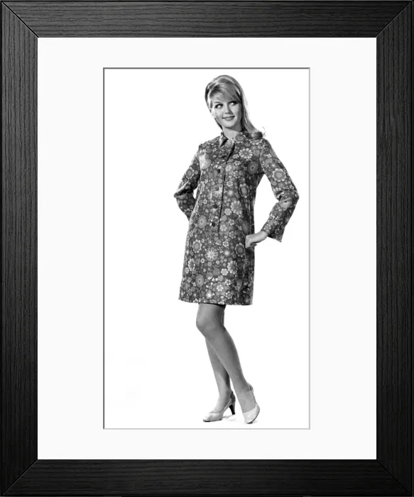 Framed Print : This classic shirt-dress has a superbly slim-line front band Framed Print : This classic shirt-dress has a superbly slim-line front band