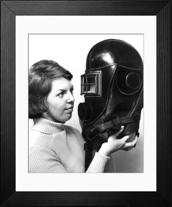 Framed Print : Jane Ectis looks at a mine rescue helmet on show at a Durham City exhibition in April Framed Print : Jane Ectis looks at a mine rescue helmet on show at a Durham City exhibition in April
