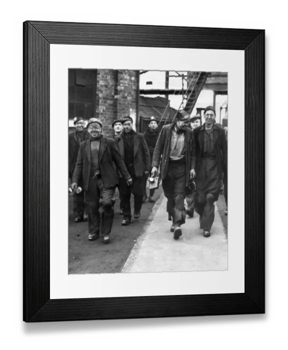 Framed Print : Beaming miners leaving Ravensworth Colliery near Birtley after a Saturday morning shift