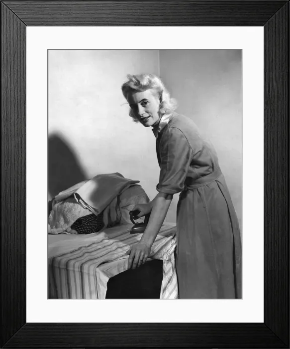 Framed Print : Domestic scenes showing a housewife doing the ironing. December 1944 P010079 Framed Print : Domestic scenes showing a housewife doing the ironing. December 1944 P010079