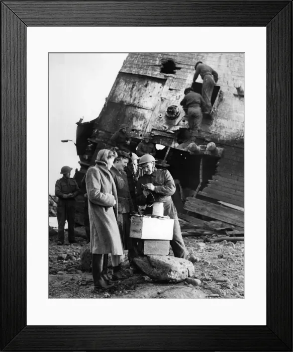 Framed Print : A soldier talking with women at a salvage yard. December 1942 P010137 Framed Print : A soldier talking with women at a salvage yard. December 1942 P010137