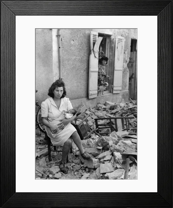 Framed Print : Madam Papin with her baby who was born at the height of the allied bombing of Caen Framed Print : Madam Papin with her baby who was born at the height of the allied bombing of Caen
