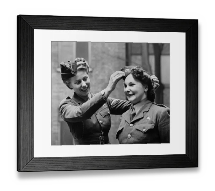 Framed Print : Members of the ATS adjust their caps before a parade. March 1944 P010241 Framed Print : Members of the ATS adjust their caps before a parade. March 1944 P010241