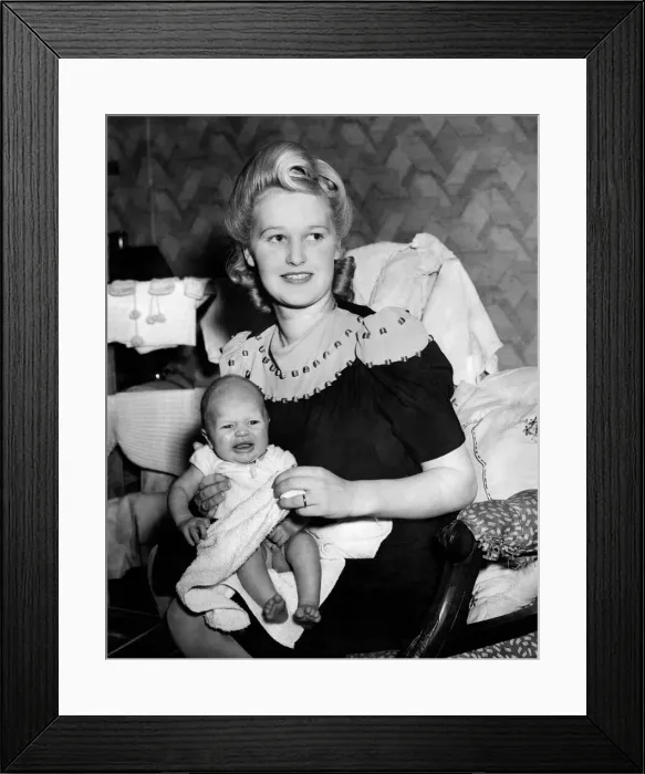 Framed Print : Mother at home with baby during the war. December 1944 P010076