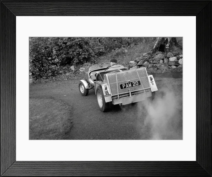 Framed Print : Man driving a steam powered car near his home December 1970 70-11615 Framed Print : Man driving a steam powered car near his home December 1970 70-11615