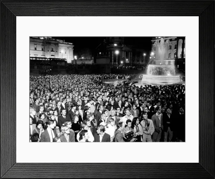 Framed Print : Election night scene in Trafalgar Square as people watch Ted Heath